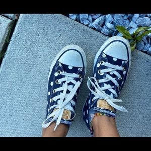 Blue and white polka dotted converse